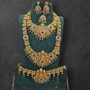HEAVY WHITE STONE MIXED LAKSHMI COMBO IN ANTIQUE LOOK ( GREEN BEADS HANGING )