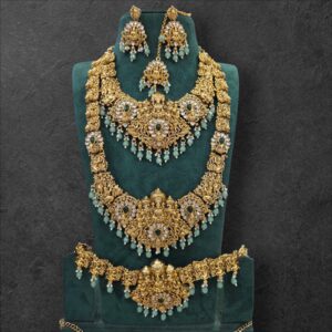 HEAVY WHITE STONE MIXED LAKSHMI SEMI BRIDAL IN MINT GREEN HANGING