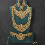 HEAVY WHITE STONE MIXED LAKSHMI SEMI BRIDAL IN GOLDEN BEADS HANGING