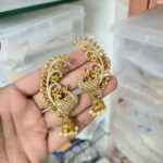 BLUETOOTH EARING AD STONE WITH PEACOCK DEISGN